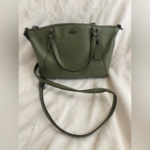 Military green Coach crossbody.